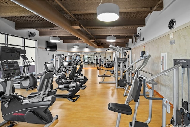 gym featuring light hardwood / wood-style floors