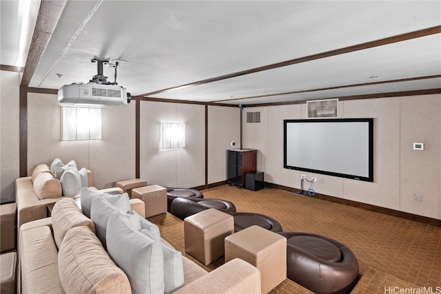 home theater with light carpet and crown molding