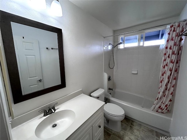 full bathroom with vanity, toilet, and shower / tub combo