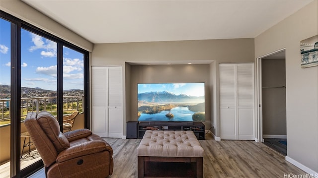 sitting room with hardwood / wood-style floors