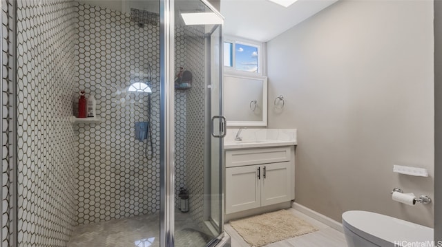 bathroom with vanity, an enclosed shower, hardwood / wood-style floors, and toilet