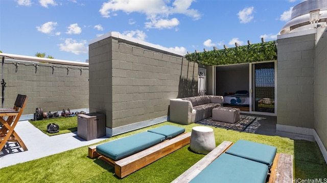 exterior space featuring a patio area and an outdoor hangout area