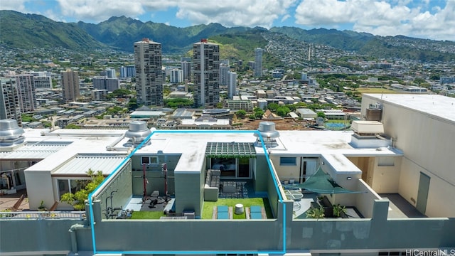 birds eye view of property featuring a mountain view