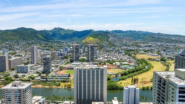 bird's eye view featuring a water and mountain view