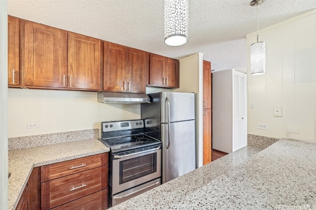 kitchen featuring stainless steel appliances, light stone countertops, a textured ceiling, and hanging light fixtures