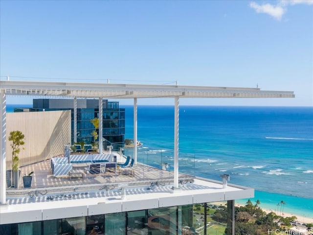 balcony featuring a water view