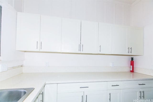 kitchen with white cabinets