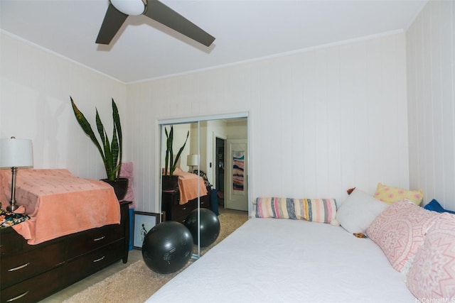 1103 10th Ave, Honolulu, HI 96816 - bedroom with ornamental molding, carpet, ceiling fan, and a closet