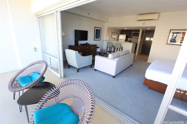 carpeted living room featuring a wall mounted AC