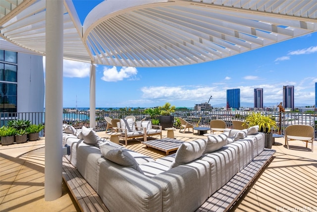 view of patio / terrace featuring an outdoor living space and a water view