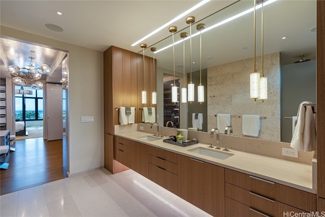 bathroom with vanity, tasteful backsplash, and wood-type flooring