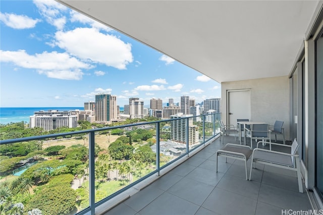 balcony featuring a water view