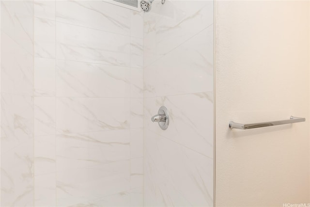 full bathroom with tiled shower