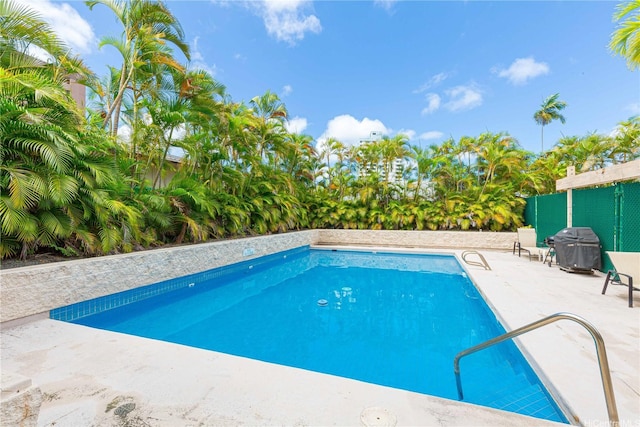 pool featuring a patio