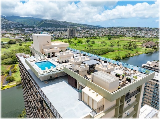 aerial view featuring a water and mountain view