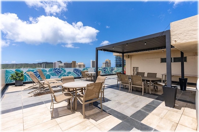 2345 Ala Wai Blvd Unit 1814, Honolulu, HI 96815 - view of patio featuring outdoor dining space and a city view