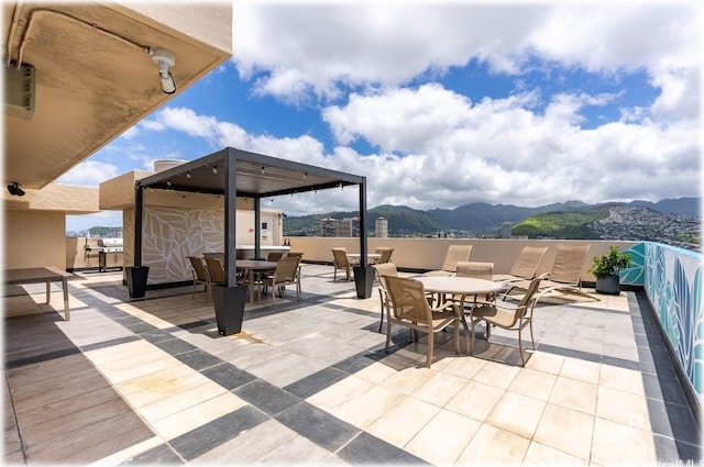 view of patio with a mountain view