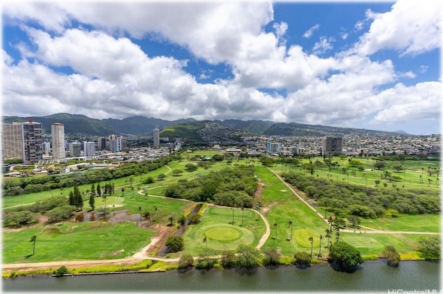 drone / aerial view featuring a water and mountain view