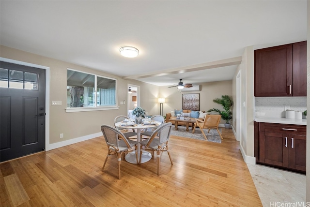 dining room featuring ceiling fan and light hardwood / wood-style flooring