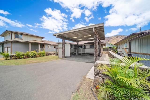 exterior space with a carport