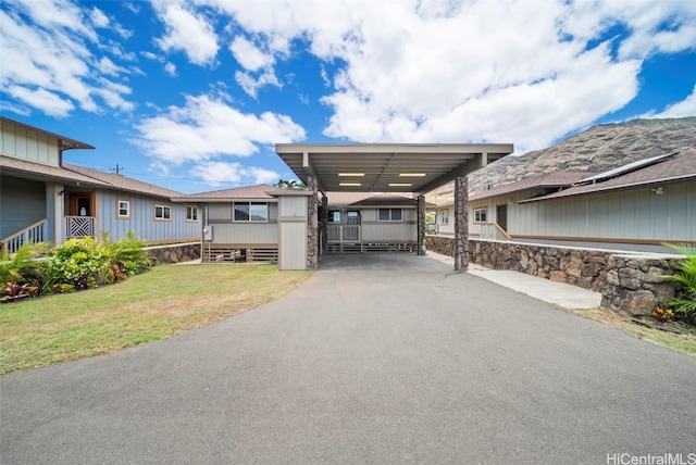 exterior space featuring a front yard