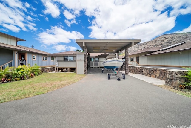 view of patio / terrace featuring a carport