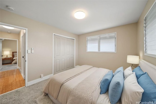 carpeted bedroom featuring a closet