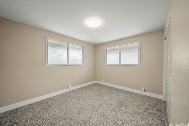 empty room featuring carpet