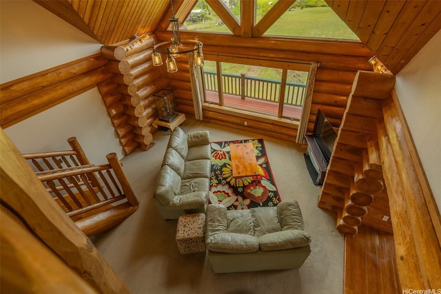 16-1125 Poouli Rd, Kurtistown, HI 96760 - living room featuring rustic walls, wooden ceiling, high vaulted ceiling, and carpet floors
