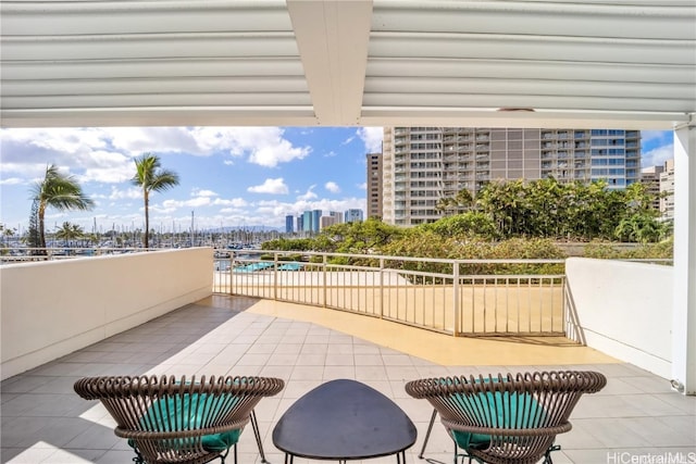 view of patio / terrace with a balcony