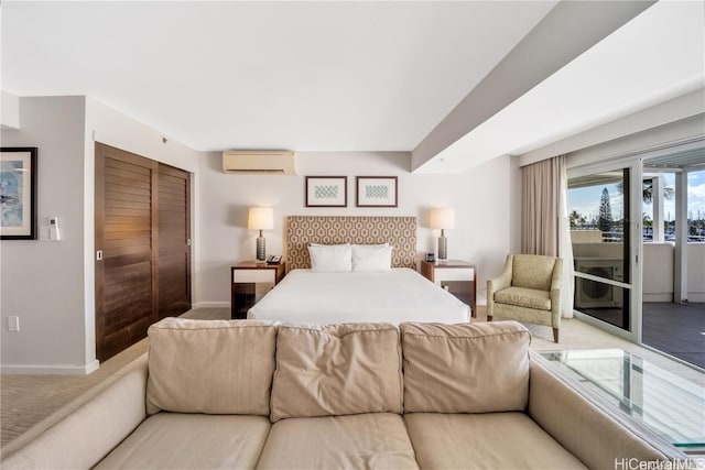 carpeted bedroom featuring an AC wall unit and a closet