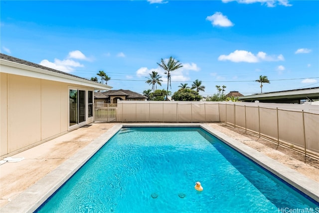 view of swimming pool featuring a patio area