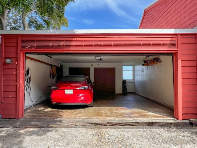 garage featuring a carport