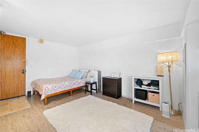 bedroom featuring hardwood / wood-style flooring