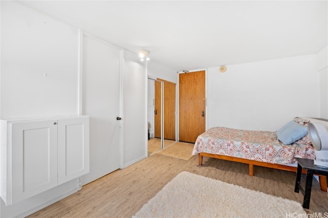 bedroom featuring light hardwood / wood-style floors