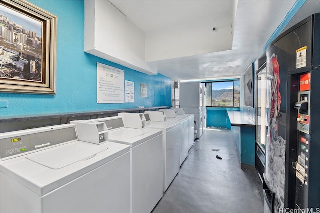 laundry room with washing machine and clothes dryer