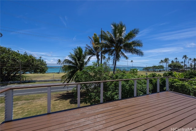 wooden terrace with a water view