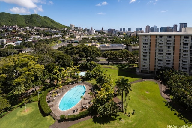 birds eye view of property with a mountain view