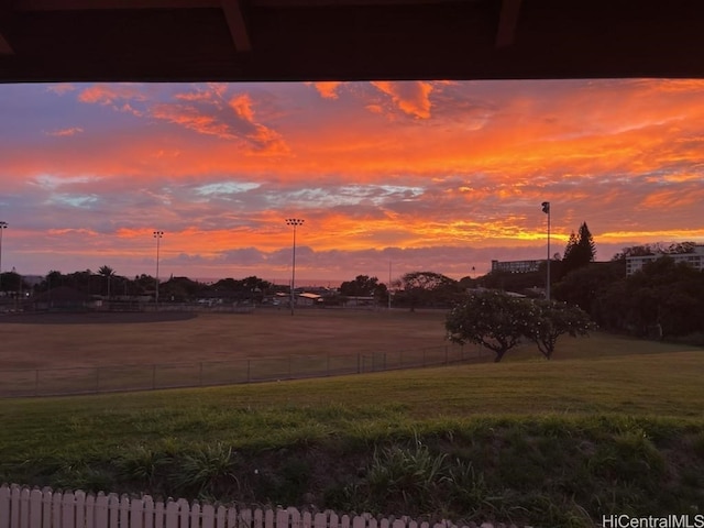 view of yard at dusk