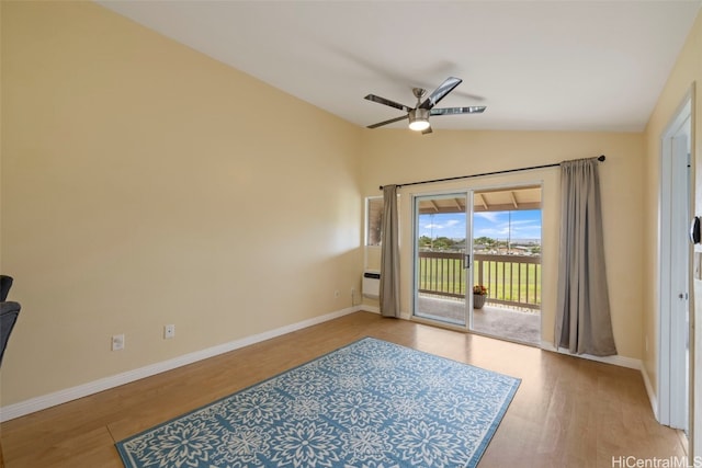 unfurnished room featuring vaulted ceiling, ceiling fan, and light hardwood / wood-style floors