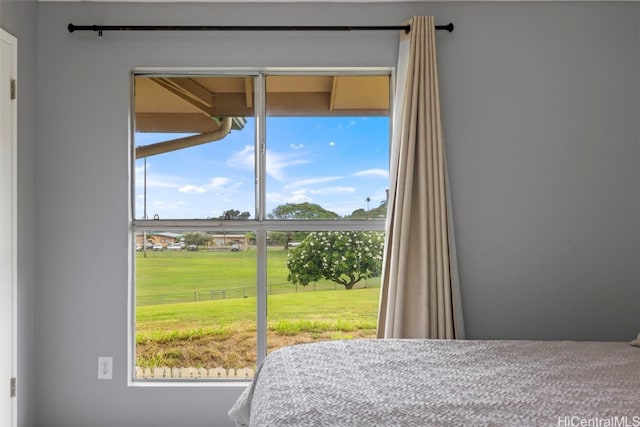 bedroom featuring multiple windows