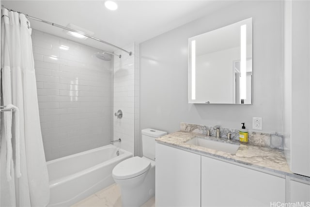 full bathroom featuring shower / bath combo, toilet, and vanity