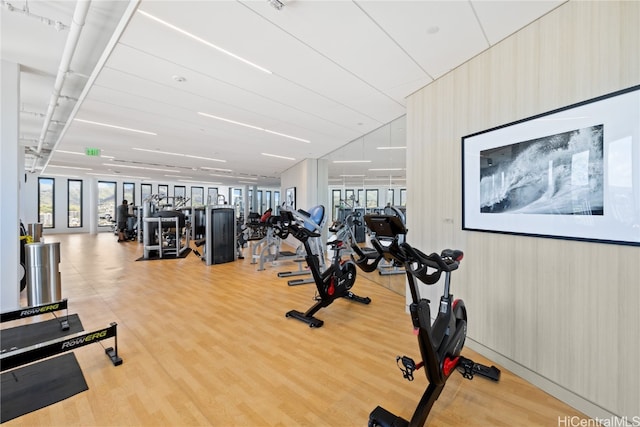 workout area with light wood-type flooring