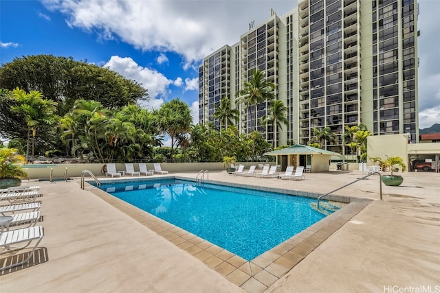 view of swimming pool featuring a patio