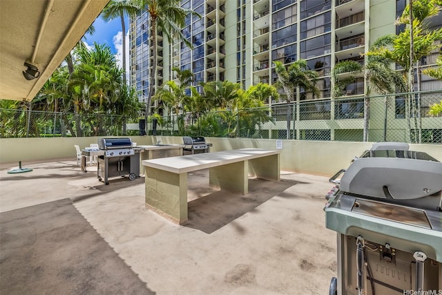 322 Aoloa St Unit Ph-9, Kailua, HI 96734 - view of patio / terrace with fence and area for grilling