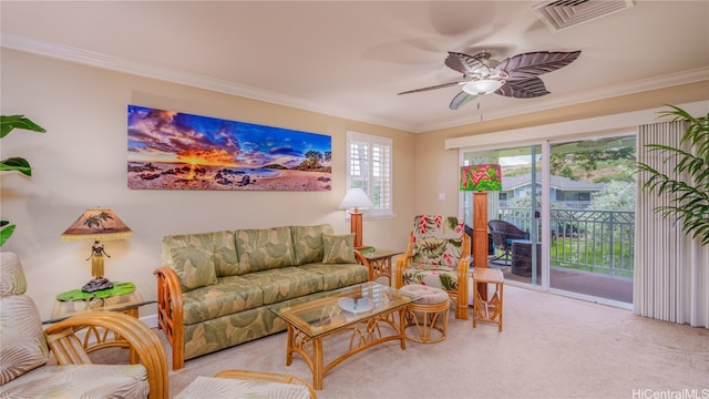 carpeted living room with ceiling fan and ornamental molding