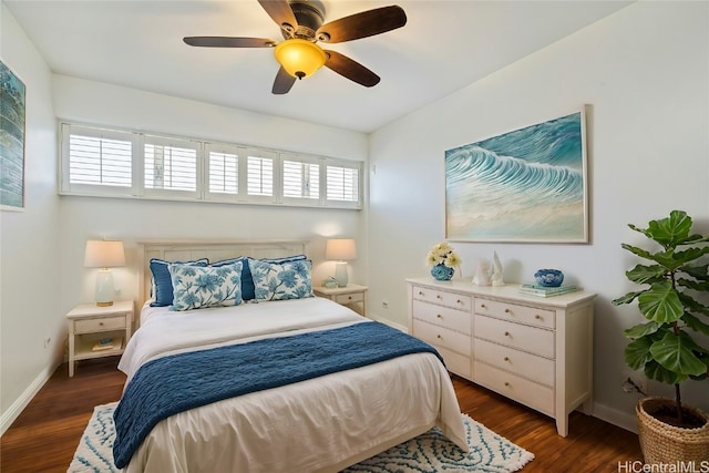 bedroom featuring dark hardwood / wood-style floors and ceiling fan