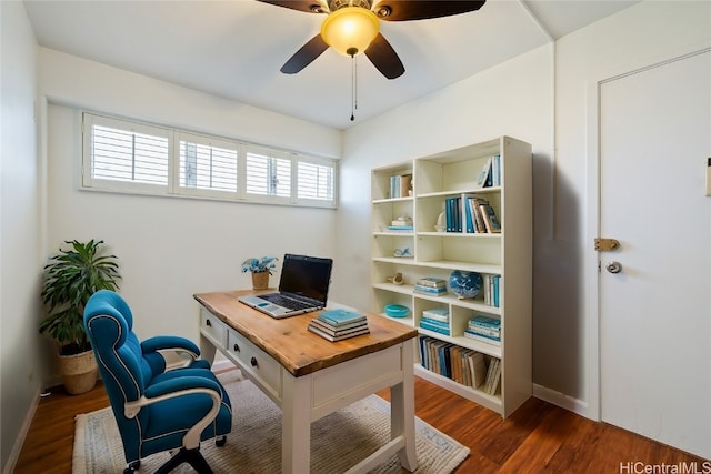 office area featuring a wealth of natural light, dark hardwood / wood-style floors, and ceiling fan