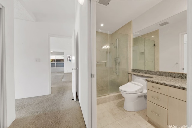 bathroom with vanity, an enclosed shower, toilet, and tile patterned floors