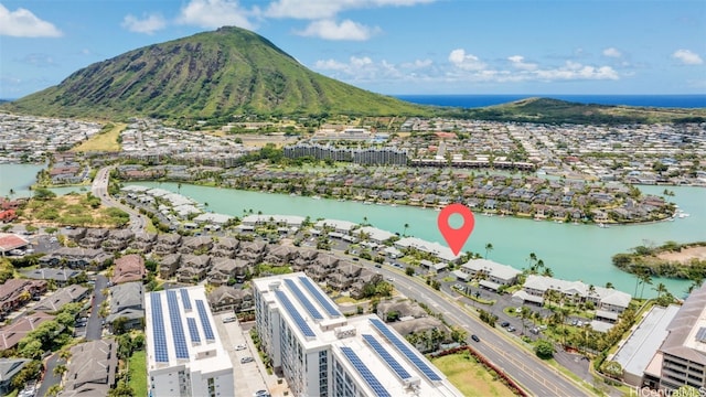 bird's eye view with a water and mountain view